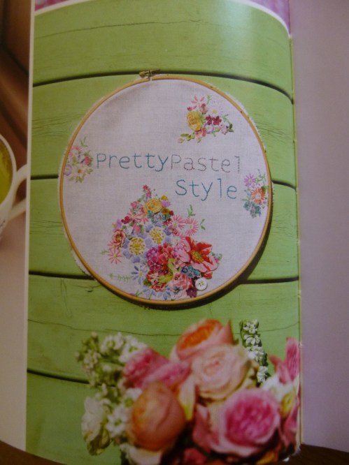 The lovely embroidered hoop is by Vicky Trainor